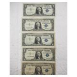 Five assorted silver certificates all $1 notes