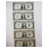 Five assorted silver certificates all $1 notes