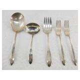 Several pieces of sterling silver flatware,  282.9