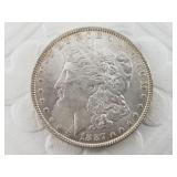 1887 Morgan silver dollar