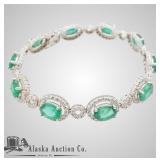 14kt Gold emerald and diamond bracelet, 9 evenly p
