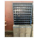 Several pieces of metal storage for fasteners and