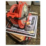 Lot with an extension cord and spool, backpack, an
