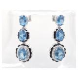 14kt White gold diamond and aquamarine earrings.