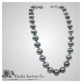 14kt Gold Tahitian pearl necklace, strand has 31 p