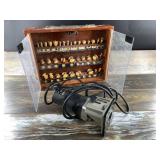 Lot with a Porter Cable wood router and a case of