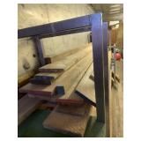 Shelf lot with 16 boards, mostly hardwood, mostly