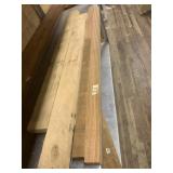 Several hard wood planks varying species, longest