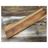 Curly koa board, 23" x 5.5" x 1 3/4" with a small