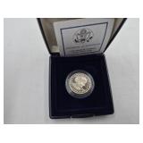 1999 Susan B. Anthony dollar coin, proof in mint c