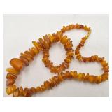 22" Long amber chip necklace with threaded clasp,
