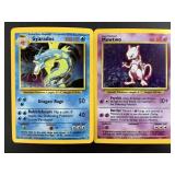 Two 1999 Vintage Pokemon Holographic Cards. Includ