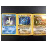 Three 1999 Vintage Pokemon Holographic Cards. Incl
