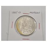 1885 O Morgan silver dollar
