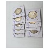 Twelve 40% silver Kennedy half dollars various dat