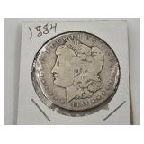 1884 O Morgan silver dollar