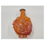 Chinese hand carved simulated amber snuff bottle w