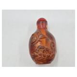 Chinese hand carved simulated amber snuff bottle w
