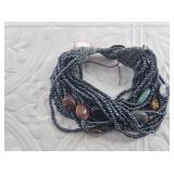 Multi-strand hematite bead necklace with assorted