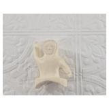 Walrus ivory kayaker once part of a larger piece,