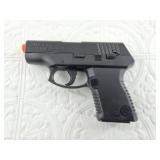 Spring loaded Air soft pistol modeled after a Taur