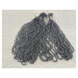 Dozens of strands of hematite beads between 3 and
