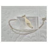 Small ivory seal pendant on a short chain