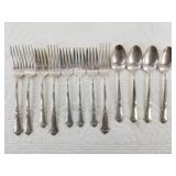 12 Pieces of sterling silver flatware spoons and f