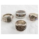 4 Sterling silver rings: sizes 7, 8, 8, 8