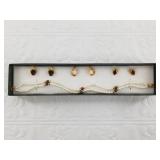 New in box earring and bracelet set with 3 sets of