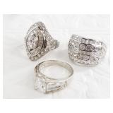 3 Sterling silver rings: sizes 8, 8, 9