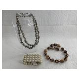 Lot with costume jewelry including a 4 strand cost