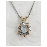 10kt Gold, diamond and aquamarine pendant, on ster