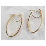 Pair of 14kt gold earrings, weight is 1.55 grams t