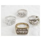 4 Sterling silver rings: sizes 11, 8, 8, 7