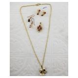 Gold plate and garnet jewelry pieces including pen