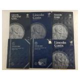 Variety of Lincoln cent folders Volumes II and III