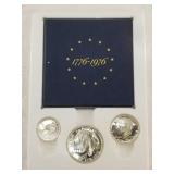 1976 S Bicentennial Dollar, half, and quarter with