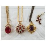 Several gold plated pieces of jewelry