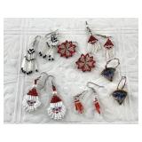Many pairs of hand beaded earrings