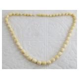 Beautiful ivory necklace made from polished rounde