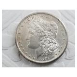 Morgan Silver dollar:  1881 S AU or better