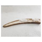 Davis Mokiyak carving of several seals and walrus,