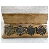 4 Piece Alaskan Bronze token set, all are numbered