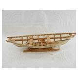 Well made miniature of a sled and a skin bound umi