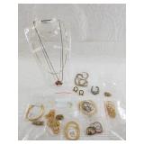 Dozens of gold toned chains mostly Avon