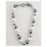 Cultured pearl necklace with a hand tied strand, s