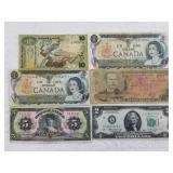 Variety of paper currency: Unc. US $2 bill, and 19
