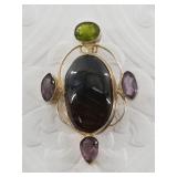 Sterling silver pendant with variety of semi-preci