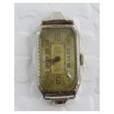 Vintage 18kt white gold watch face, in working ord